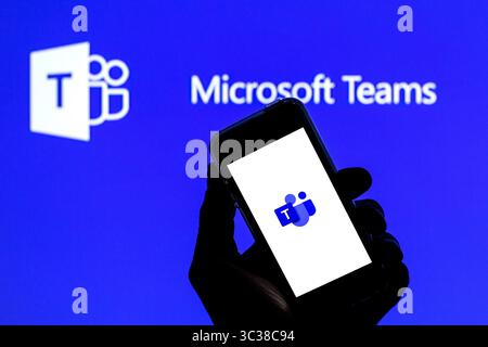 April 20, 2021, Barcelona, Catalonia, Spain: In this photo illustration a Microsoft Teams app seen displayed on a smartphone with the Microsoft Teams logo in the background. (Credit Image: © Thiago Prudencio/DAX via ZUMA Wire) Stock Photo