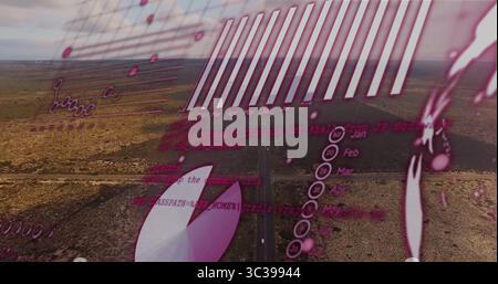 Displaying digital overlay showing bar chart, line graph, pie, timeline, above arid desert highway Stock Photo