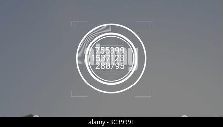 Showing digital circular interface with progress arc, readouts and corner markers on grey backdrop Stock Photo