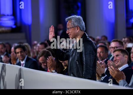 Washington, United States Of America. 23rd July, 2025. Washington, United States of America. 23 July, 2025. Nvidia CEO Jensen Huang is recognized by U.S. President Donald Trump, during the White House AI Summit at the Andrew W. Mellon Auditorium, July 23, 2025 in Washington, DC During the event Trump unveiled his AI action plan Credit: Joyce Boghosian/White House Photo/Ģ����ý Live News Stock Photo