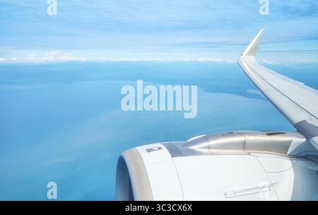 An airplane jet engine as seen from the cockpit Stock Photo