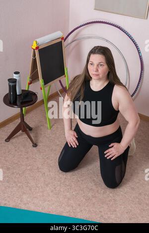Fat nude woman kneeling Stock Photo - Alamy
