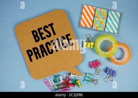 Best Practice text with stationery on blue background Stock Photo