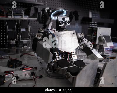 A robot is on the workbench Stock Photo