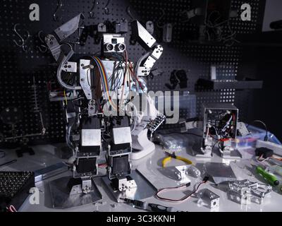 A robot is on the workbench Stock Photo