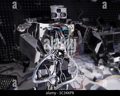 A robot is on the workbench Stock Photo