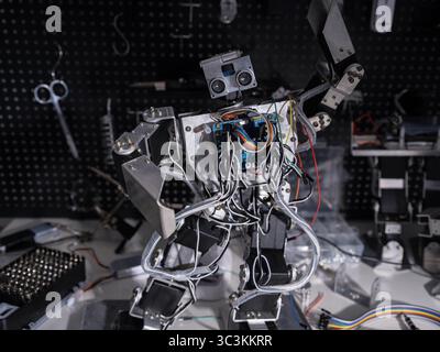 A robot is on the workbench Stock Photo