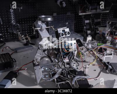A robot is on the workbench Stock Photo