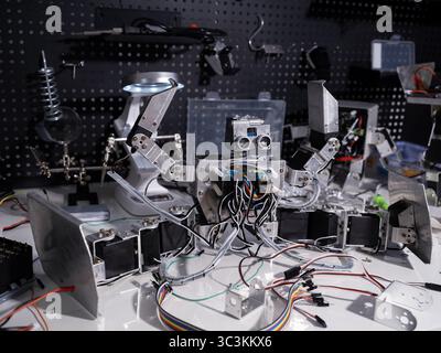A robot is on the workbench Stock Photo