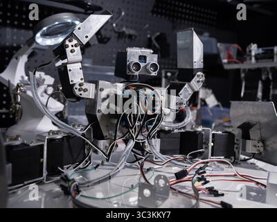 A robot is on the workbench Stock Photo
