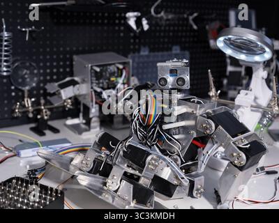 Study on robot on the workbench Stock Photo