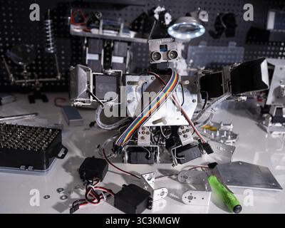A robot is on the workbench Stock Photo