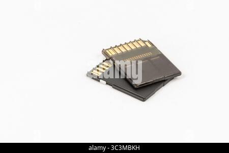 Black unbranded memory SD cards, isolated on white background Stock Photo