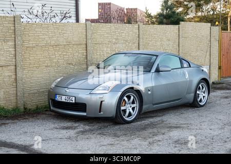 Nissan 350Z Japanese sport car side view isolated on white background