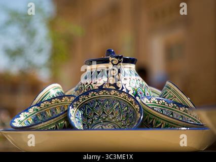 Ceramic tableware set with the typical Khorezm patterns. Stock Photo