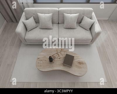 A modern living room features a sleek grey sofa, elegant pillows, and a unique coffee table on a soft rug. The serene ambiance is complemented by neut Stock Photo