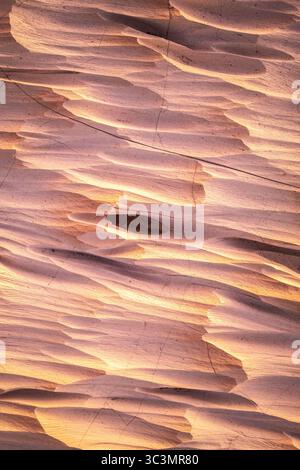 Stunning golden pumice stone formations in Catamarca, Argentina, captured at sunset. The textured surface and warm hues create a breathtaking natural Stock Photo
