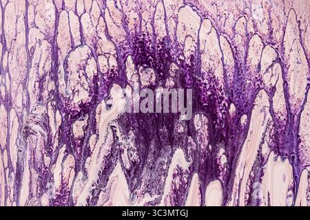 Vibrant abstract acrylic paint background featuring dynamic purple and white textures. Perfect for creative projects and adding a splash of color and Stock Photo