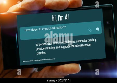 How does AI impact education? Question for AI on tablet screen AI personalizes learning experiences, automates grading, provides tutoring, and support Stock Photo