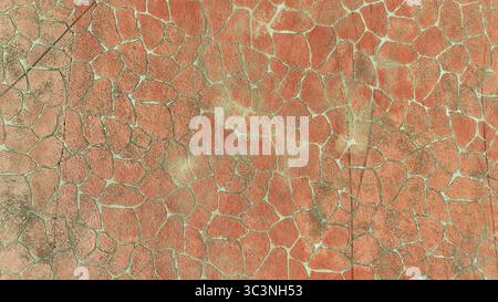 Weathered stamped concrete in red color top view Stock Photo