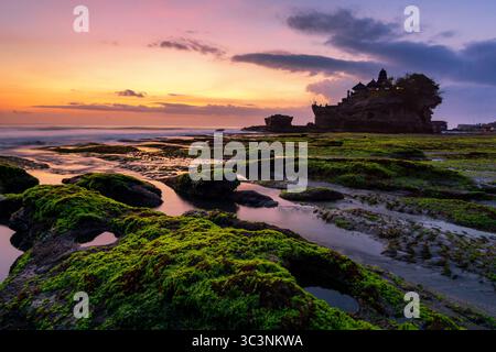 Beautiful sunset at Tanah Lot temple in Bali Indonesia Stock Photo