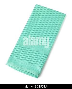 Clean folded green towel with honeycomb pattern isolated on white background Stock Photo