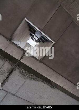 modern urban geometry in low angle view with the sky in the background. grayscale building Stock Photo