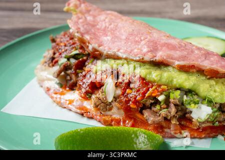 A view of a loaded corn quesadilla. Stock Photo