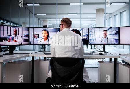 Virtual Job Interview With Young Man In Office Using Computer Stock Photo