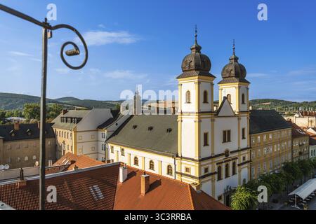 View from the city tower of the Piarist Church of St Francis Xavier and the old town in the evening light, Capital of Culture 2026, TrenDin, Slovaki Stock Photo