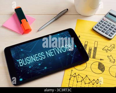 Business global network connection, telecommunication and technology. Networking. Digital tablet showing a business network concept, lying on a desk w Stock Photo