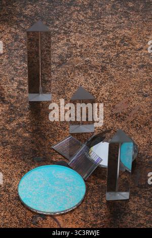 Collection of glass objects, including a blue and white circle Stock Photo