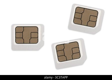 Three sim cards are displayed on a white background, ready for mobile device activation Stock Photo