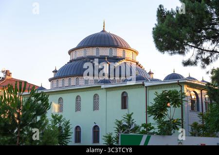Iznik, Bursa, Turkiye - 20 JUL 2025: Candarlioglu Mosque is a local neighborhood mosque with a front facade covered with Iznik tiles, Iznik, Bursa, Tu Stock Photo