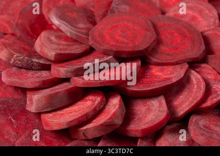 Fresh Red Beet Cut into Perfect Rounds, Ready to Cook. Stock Photo