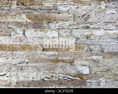 Old stone wall of a building. Stone wall as background or rustic pattern for wallpaper. High quality photo Stock Photo