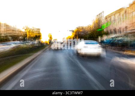 Abstract photography. Deliberately shaken, out of focus, blurred, inconsistently exposed. Creative digitally processed street photography. Stock Photo
