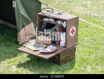 Close up of a second world war wooden first aid box full of medical supplies on display at the 2025 Suffolk military show at Trinity Park, Ipswich Stock Photo