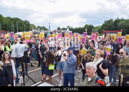 Epping, UK. 27th July, 2025. Protesters gather outside Epping Station with placards in support of refugees and against the far right during the pro-migrant demonstration in Epping. Several anti-migrant protests targeting the Bell Hotel, where migrants are housed, have taken place after an asylum seeker was charged with allegedly trying to kiss a 14-year-old girl. Credit: SOPA Images Limited/Alamy Live News Stock Photo