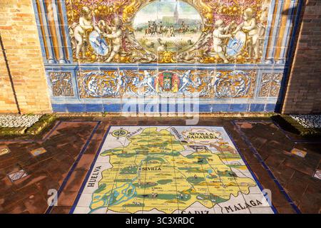 Painted Ceramic Tiles Representing Andalusia Map, Historic Plaza de Espana Intricate Multi Coloured Vibrant Flooring Art Detail,  Seville Spain Stock Photo