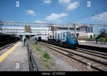 Avanti West Coast class 805 Evero train passing through Nuneaton station, Warwickshire, England, UK Stock Photo