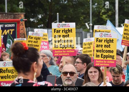 Epping, England, UK. 27th July, 2025. Protesters march in support of migrants in Epping. Several anti-migrant protests targeting the Bell Hotel, where migrants are housed, have taken place after an asylum seeker was charged with allegedly trying to kiss a 14-year-old girl. (Credit Image: © Vuk Valcic/ZUMA Press Wire) EDITORIAL USAGE ONLY! Not for Commercial USAGE! Stock Photo