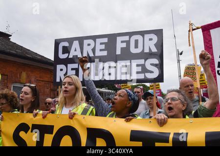 Epping, England, UK. 27th July, 2025. Protesters march in support of migrants in Epping. Several anti-migrant protests targeting the Bell Hotel, where migrants are housed, have taken place after an asylum seeker was charged with allegedly trying to kiss a 14-year-old girl. (Credit Image: © Vuk Valcic/ZUMA Press Wire) EDITORIAL USAGE ONLY! Not for Commercial USAGE! Stock Photo