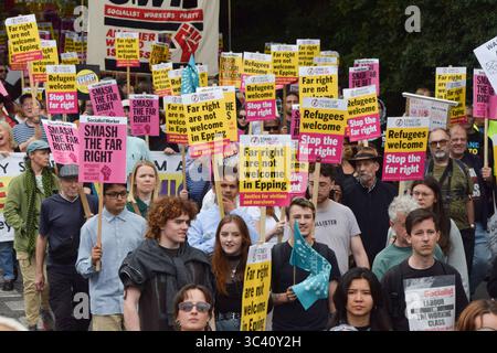 Epping, England, UK. 27th July, 2025. Protesters march in support of migrants in Epping. Several anti-migrant protests targeting the Bell Hotel, where migrants are housed, have taken place after an asylum seeker was charged with allegedly trying to kiss a 14-year-old girl. (Credit Image: © Vuk Valcic/ZUMA Press Wire) EDITORIAL USAGE ONLY! Not for Commercial USAGE! Stock Photo