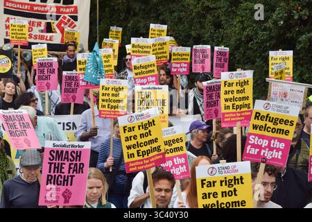 Epping, England, UK. 27th July, 2025. Protesters march in support of migrants in Epping. Several anti-migrant protests targeting the Bell Hotel, where migrants are housed, have taken place after an asylum seeker was charged with allegedly trying to kiss a 14-year-old girl. (Credit Image: © Vuk Valcic/ZUMA Press Wire) EDITORIAL USAGE ONLY! Not for Commercial USAGE! Stock Photo