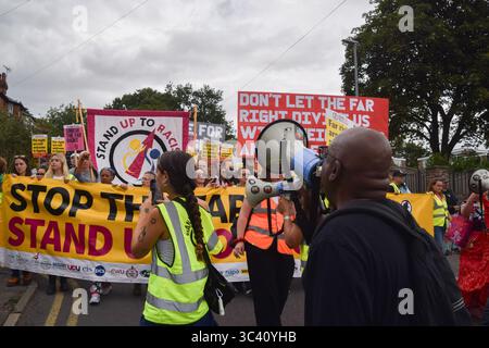 Epping, England, UK. 27th July, 2025. Protesters march in support of migrants in Epping. Several anti-migrant protests targeting the Bell Hotel, where migrants are housed, have taken place after an asylum seeker was charged with allegedly trying to kiss a 14-year-old girl. (Credit Image: © Vuk Valcic/ZUMA Press Wire) EDITORIAL USAGE ONLY! Not for Commercial USAGE! Stock Photo