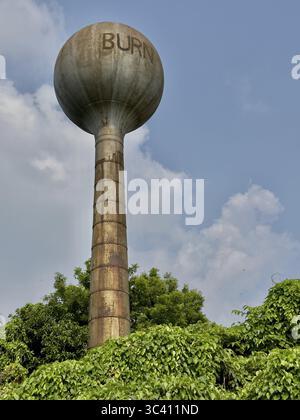 old rusty water tower and clear blue sky Stock Photo - Alamy