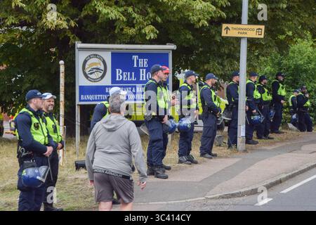 Epping, England, UK. 27th July, 2025. A heavy police presence outside the Bell Hotel in Epping as both pro- and anti- migrant protesters gather. Several anti-migrant protests targeting the hotel have taken place, after an asylum seeker was charged with allegedly trying to kiss a 14-year-old girl. (Credit Image: © Vuk Valcic/ZUMA Press Wire) EDITORIAL USAGE ONLY! Not for Commercial USAGE! Stock Photo