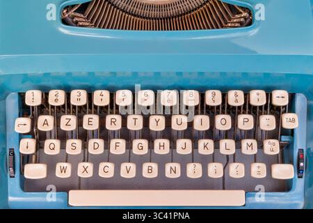 Top view of a seventies blue Azerty typewriter Stock Photo