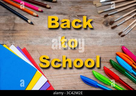 school background surrounded by school supplies, back-to-school concepts or creative learning, School or art workspace, drawing and writing Learning t Stock Photo